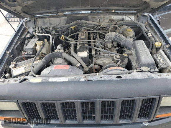 1998 Jeep Cherokee Sport with VIN 1J4FJ68S6WL188802, listed as a Copart auction lot 52094005 with 199,586 mi miles and Salvage Title. Bid and sale history available at carsss.com. Image 12.
