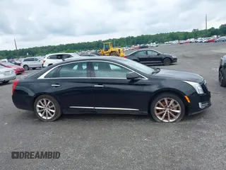 2013 Cadillac XTS Luxury z VIN 2G61P5S34D9183065, wystawiony jako IAAI lot #42665741 z przebiegiem 209 585 mil mil oraz . Historia ofert i sprzedaży dostępna na DreamBid. Obrazek 14.