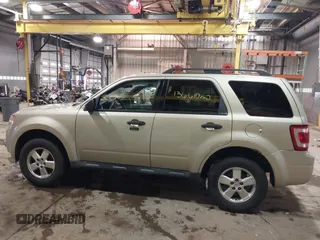 2011 Ford Escape XLT with VIN 1FMCU0D75BKB11168, listed as a IAAI auction lot 41327470 with 136,610 mi miles. Bid and sale history available at carsss.com. Image 15.