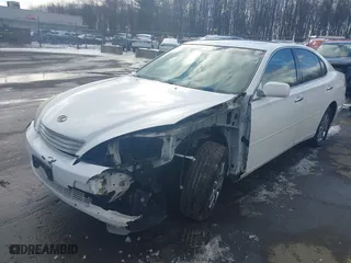 2004 Lexus ES 330 with VIN JTHBA30G745021245, listed as a IAAI auction lot 41530505 with 291,409 mi miles. Bid and sale history available at carsss.com. Image 18.