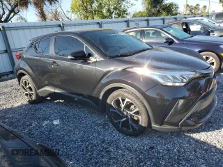 2021 Toyota C-HR LE with VIN NMTKHMBX0MR125200, listed as a Copart auction lot 48676315 with 82,241 mi miles and Salvage Title. Bid and sale history available at carsss.com. Image 4.
