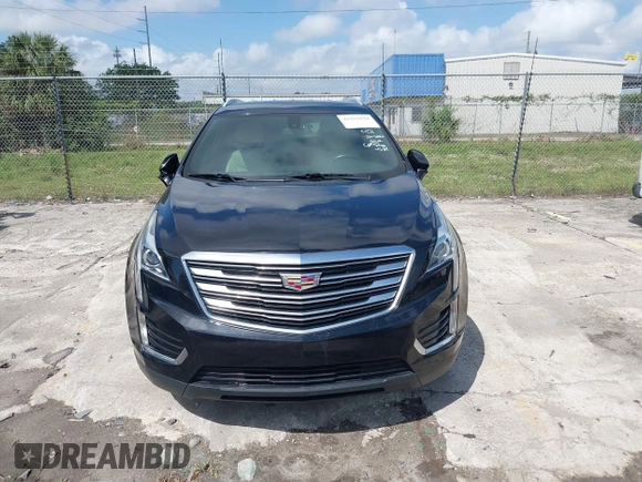 2017 Cadillac XT5 FWD with VIN 1GYKNARS6HZ123114, listed as a IAAI auction lot 41933928 with 166,213 mi miles. Bid and sale history available at carsss.com. Image 12.