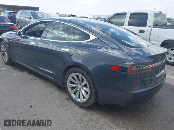 2016 Tesla Model S 70 with VIN 5YJSA1E14GF157118, listed as a IAAI auction lot 41794381 with 53,651 mi miles and . Bid and sale history available at DreamBid. Image 3.