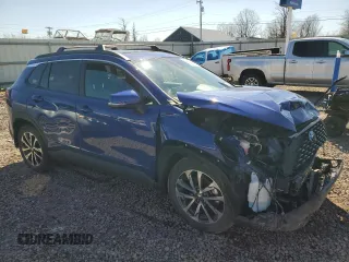 2022 Toyota Corolla Cross XLE with VIN 7MUDAABG3NV006450, listed as a Copart auction lot 53240735 with 19,976 mi miles and Salvage title. Bid and sale history available at DreamBid. Image 4.