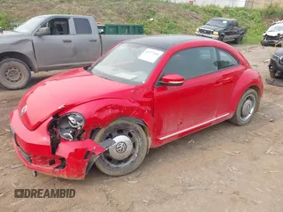 2012 Volkswagen Beetle 2.5L PZEV with VIN 3VWJP7AT8CM637489, listed as a IAAI auction lot 42377559 with 174,295 mi miles and . Bid and sale history available at DreamBid. Image 17.