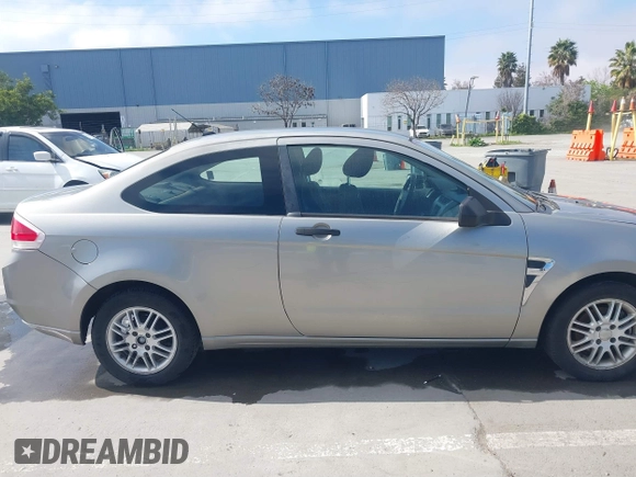 2008 Ford Focus SE with VIN 1FAHP33NX8W135881, listed as a IAAI auction lot 41668949 with 160,261 mi miles. Bid and sale history available at carsss.com. Image 14.