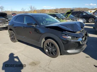2021 Mazda CX-30 Premium Plus with VIN 3MVDMBEY8MM310933, listed as a Copart auction lot 78295304 with 32,556 mi miles and Salvage Title. Bid and sale history available at DreamBid. Image 4.