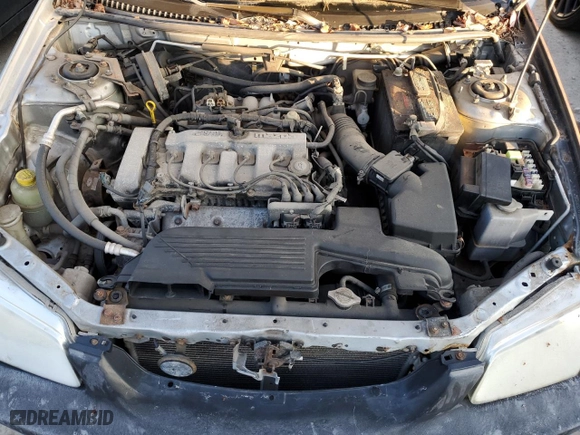 2000 Mazda Protege ES with VIN JM1BJ2213Y0266275, listed as a Copart auction lot 59480054 with 189,616 mi miles and Salvage Title. Bid and sale history available at carsss.com. Image 11.