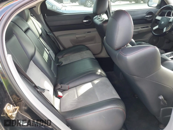 2006 Dodge Charger SRT-8 with VIN 2B3LA73W96H371246, listed as a IAAI auction lot 41676168 with 130,064 mi miles and . Bid and sale history available at carsss.com. Image 8.