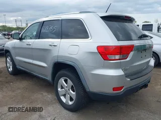 2011 Jeep Grand Cherokee Laredo with VIN 1J4RR4GG0BC622732, listed as a IAAI auction lot 42218785 with 127,186 mi miles and . Bid and sale history available at DreamBid. Image 3.