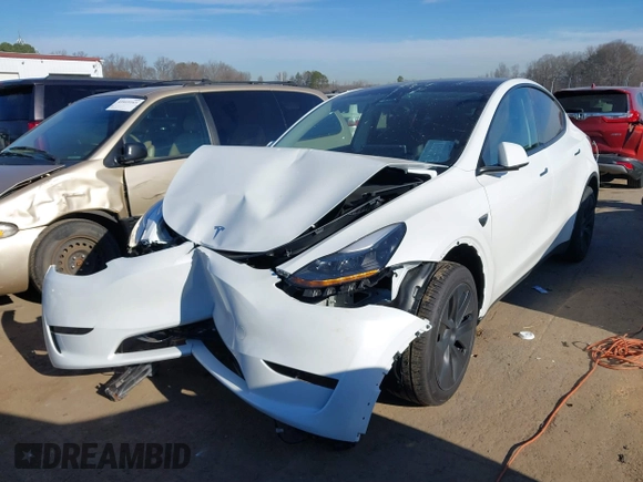 2025 Tesla Model Y Long Range with VIN 7SAYGDED9SA342374, listed as a IAAI auction lot 41663085 with 4,115 mi miles and . Bid and sale history available at DreamBid. Image 20.