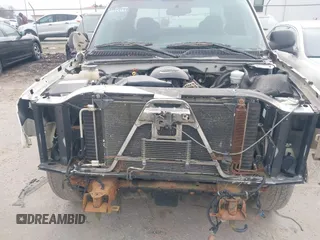 2005 Chevrolet Silverado 1500 with VIN 1GCEK19V65E152928, listed as a IAAI auction lot 41485115 with 165,560 mi miles. Bid and sale history available at carsss.com. Image 6.