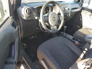 2016 Jeep Wrangler Willys Wheeler with VIN 1C4AJWAG5GL266235, listed as a Copart auction lot 50237195 with 60,830 mi miles and Salvage title. Bid and sale history available at DreamBid. Image 8.