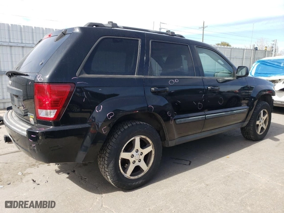 2007 Jeep Grand Cherokee Laredo with VIN 1J8HR48P67C698021, listed as a Copart auction lot 50022895 with 176,120 mi miles and Salvage Title. Bid and sale history available at carsss.com. Image 3.