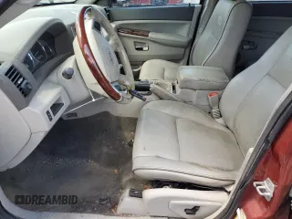 2009 Jeep Grand Cherokee with VIN 1J8HR68T29C512518, listed as a Copart auction lot 58894174 with 113,181 mi miles and Salvage title. Bid and sale history available at DreamBid. Image 7.