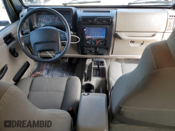 2003 Jeep Wrangler Sahara with VIN 1J4FA59S03P313418, listed as a Copart auction lot 64883094 with 184,658 mi miles and Salvage title. Bid and sale history available at DreamBid. Image 8.