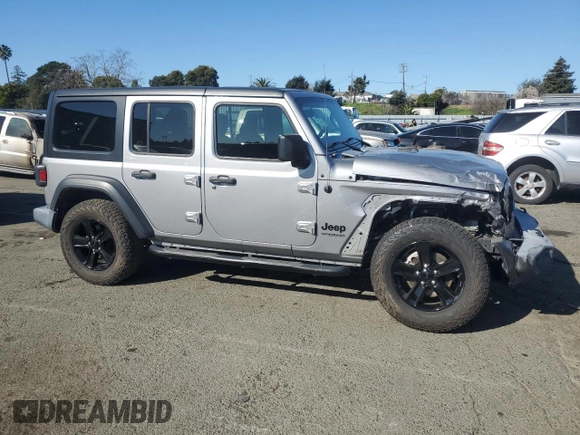 2019 Jeep Wrangler Unlimited Sport with VIN 1C4HJXDG8KW632213, listed as a Copart auction lot 42623815 with 121,014 mi miles and Salvage title. Bid and sale history available at DreamBid. Image 4.