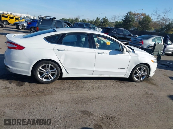 2015 Ford Fusion SE Hybrid with VIN 3FA6P0LU3FR249444, listed as a IAAI auction lot 41602659 with 145,024 mi miles. Bid and sale history available at carsss.com. Image 13.