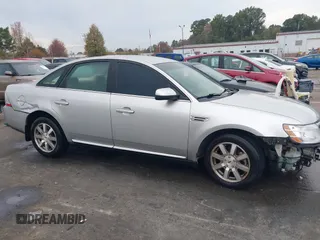 2009 Ford Taurus SEL with VIN 1FAHP24W39G102833, listed as a IAAI auction lot 40892334 with 288,418 mi miles. Bid and sale history available at carsss.com. Image 12.