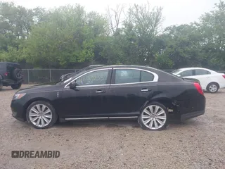 2013 Lincoln MKS EcoBoost with VIN 1LNHL9FT4DG607785, listed as a IAAI auction lot 42279833 with 126,548 mi miles and . Bid and sale history available at DreamBid. Image 14.