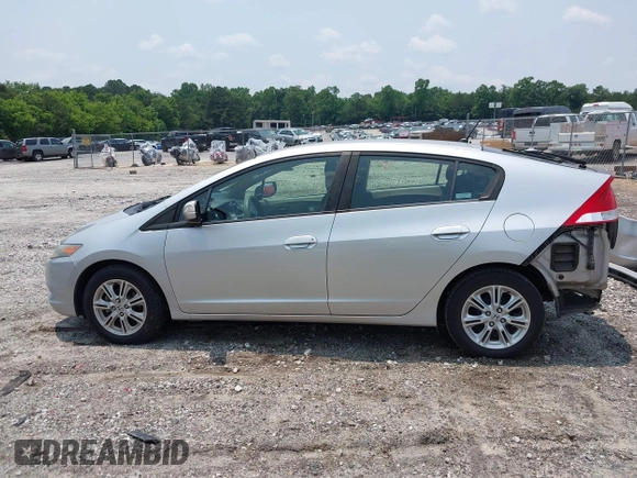 2010 Honda Insight EX with VIN JHMZE2H7XAS018581, listed as a IAAI auction lot 42398439 with 188,692 mi miles and . Bid and sale history available at DreamBid. Image 15.