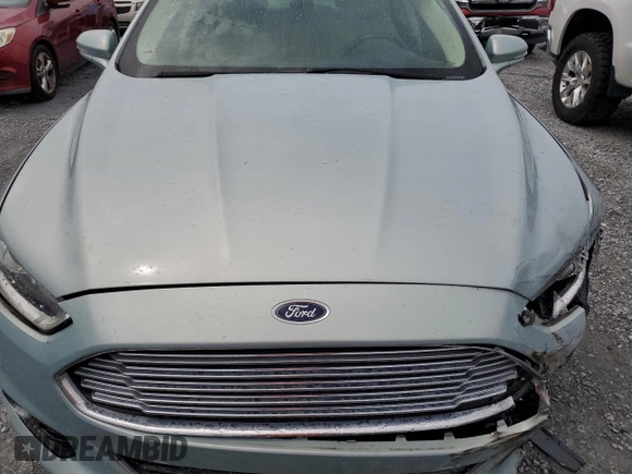 2013 Ford Fusion SE Hybrid z VIN 3FA6P0LU6DR174719, wystawiony jako Copart lot #62877715 z przebiegiem 52 884 mil mil oraz Szkoda całkowita • Salvage title. Historia ofert i sprzedaży dostępna na DreamBid. Obrazek 11.
