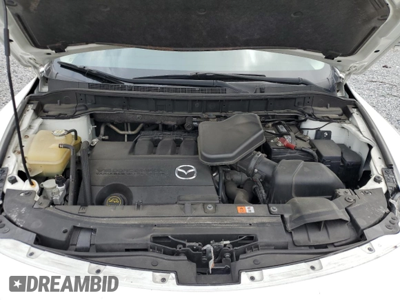 2013 Mazda CX-9 Grand Touring z VIN JM3TB2DA2D0411404, wystawiony jako Copart lot #52274675 z przebiegiem 109 476 mil mil oraz Szkoda całkowita • Salvage title. Historia ofert i sprzedaży dostępna na DreamBid. Obrazek 12.