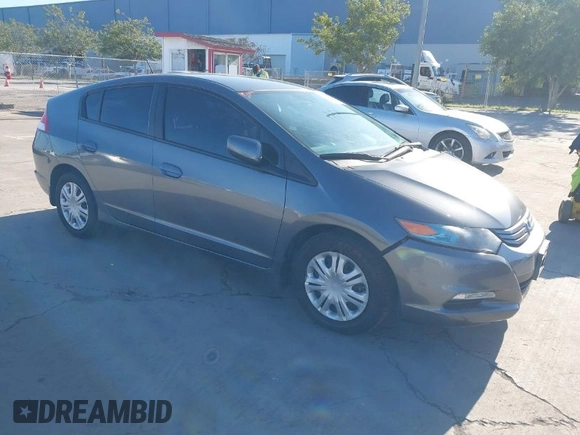 2010 Honda Insight LX with VIN JHMZE2H50AS019740, listed as a IAAI auction lot 41665527 with 74,022 mi miles and . Bid and sale history available at DreamBid. Image 1.