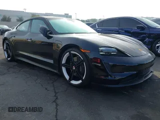 2022 Porsche Taycan z VIN WP0AA2Y11NSA17303, wystawiony jako IAAI lot #41445803 z przebiegiem 9656 mil mil oraz . Historia ofert i sprzedaży dostępna na DreamBid. Obrazek 1.