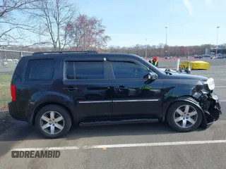 2012 Honda Pilot Touring with VIN 5FNYF4H96CB041380, listed as a IAAI auction lot 41941615 with 137,537 mi miles and . Bid and sale history available at DreamBid. Image 13.