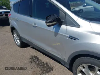 2013 Ford Escape SEL with VIN 1FMCU9HX0DUD42081, listed as a IAAI auction lot 42293456 with 100,013 mi miles and . Bid and sale history available at DreamBid. Image 6.