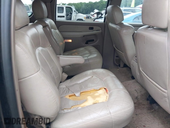2001 Chevrolet Suburban LS z VIN 1GNEC16T21J217198, wystawiony jako IAAI lot #41779416 z przebiegiem 306 172 mil mil oraz . Historia ofert i sprzedaży dostępna na DreamBid. Obrazek 8.