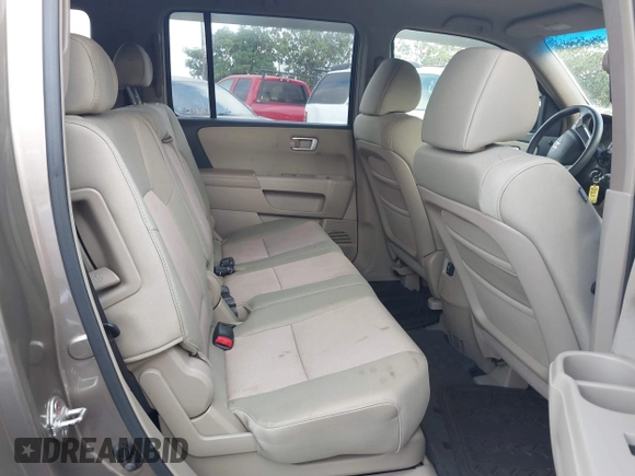 2009 Honda Pilot EX with VIN 5FNYF48499B016714, listed as a IAAI auction lot 41860249 with 143,353 mi miles and . Bid and sale history available at DreamBid. Image 8.