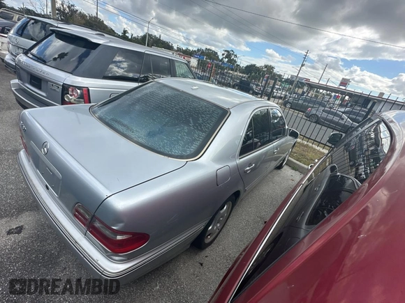 2002 Mercedes-Benz E-Class with VIN WDBJF70JX2B491915, listed as a Copart auction lot 86581554 with 206,224 mi miles and Clean Title. Bid and sale history available at carsss.com. Image 4.