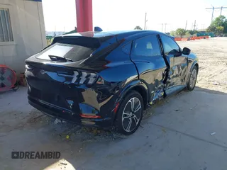 2023 Ford Mustang Mach-E Premium z VIN 3FMTK3R49PMA72364, wystawiony jako IAAI lot #41999783 z przebiegiem 15 023 mil mil oraz . Historia ofert i sprzedaży dostępna na DreamBid. Obrazek 4.