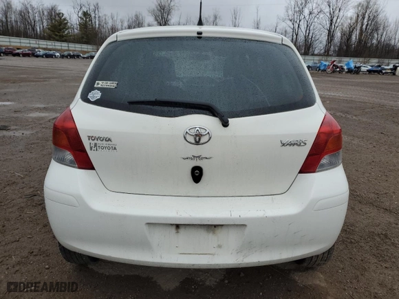 2009 Toyota Yaris with VIN JTDKT903395249312, listed as a Copart auction lot 49494835 with 294,865 mi miles and Clean Title. Bid and sale history available at carsss.com. Image 6.