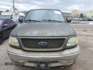 2003 Ford F-150 XLT with VIN 1FTRW08L43KC83824, listed as a IAAI auction lot 41885702 with 242,195 mi miles. Bid and sale history available at carsss.com. Image 6.