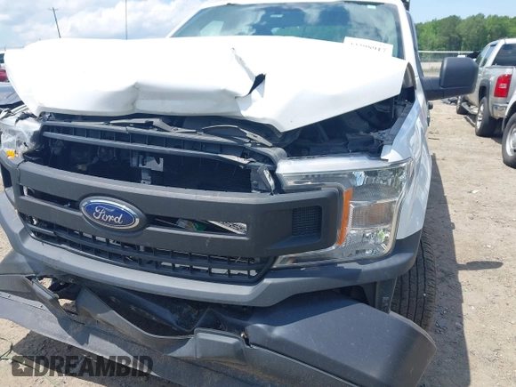 2018 Ford F-150 XL with VIN 1FTEX1CB5JFE55932, listed as a IAAI auction lot 42298917 with 143,923 mi miles and . Bid and sale history available at DreamBid. Image 19.