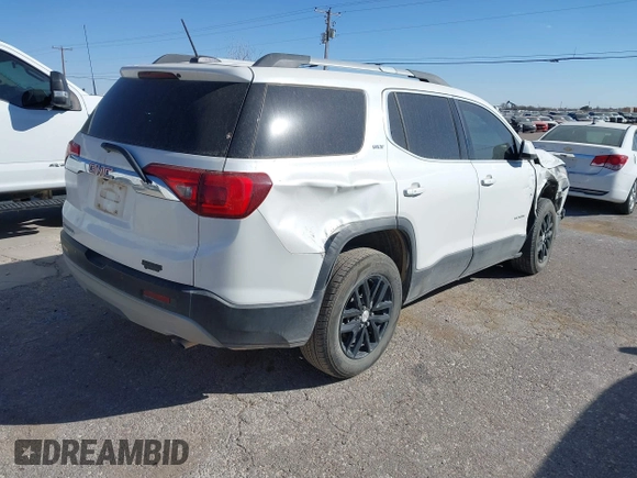 2019 GMC Acadia SLT with VIN 1GKKNMLA5KZ124323, listed as a IAAI auction lot 41365526 with 99,992 mi miles. Bid and sale history available at carsss.com. Image 4.