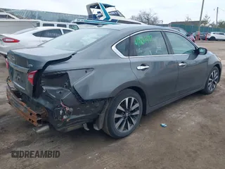 2017 Nissan Altima S with VIN 1N4AL3AP9HC153159, listed as a IAAI auction lot 41904497 with 132,495 mi miles and . Bid and sale history available at DreamBid. Image 4.