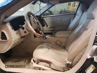 2005 Cadillac XLR z VIN 1G6YV34AX55601101, wystawiony jako Copart lot #75821644 z przebiegiem Nie podano mil oraz Szkody całkowita. Historia ofert i sprzedaży dostępna na DreamBid. Obrazek 7.