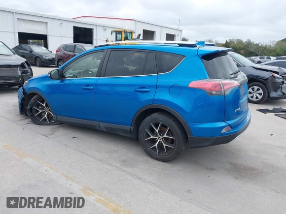 2016 Toyota RAV4 SE with VIN JTMJFREV3GJ076876, listed as a IAAI auction lot 41566899 with 133,216 mi miles and . Bid and sale history available at DreamBid. Image 3.