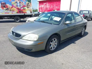 2002 Mercury Sable GS z VIN 1MEFM50U42G638338, wystawiony jako IAAI lot #42100728 z przebiegiem 208 055 mil mil oraz . Historia ofert i sprzedaży dostępna na DreamBid. Obrazek 2.