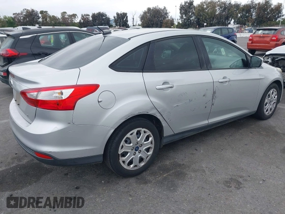 2012 Ford Focus SE with VIN 1FAHP3F27CL257447, listed as a IAAI auction lot 42180626 with 130,155 mi miles. Bid and sale history available at carsss.com. Image 4.