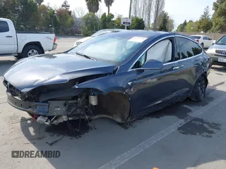 2019 Tesla Model X 75D with VIN 5YJXCBE23KF183801, listed as a IAAI auction lot 41757119 with Not Provided miles and . Bid and sale history available at carsss.com. Image 2.