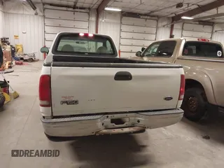 2000 Ford F-150 XL with VIN 1FTRF17W8YKB33949, listed as a IAAI auction lot 41519978 with 228,931 mi miles. Bid and sale history available at carsss.com. Image 6.