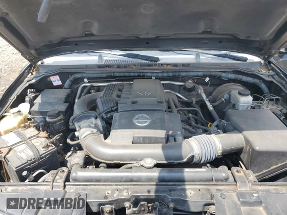 2007 Nissan Frontier SE with VIN 1N6AD09W47C428451, listed as a Copart auction lot 61809095 with 101,969 mi miles and Salvage title. Bid and sale history available at DreamBid. Image 11.
