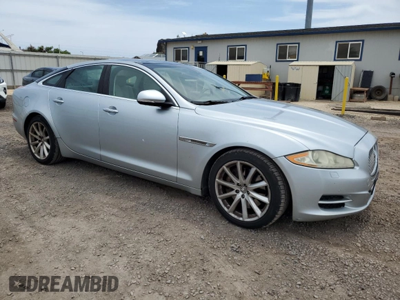 2011 Jaguar XJ with VIN SAJWA1CB9BLV05595, listed as a Copart auction lot 54947855 with 39,516 mi miles and Salvage title. Bid and sale history available at DreamBid. Image 4.
