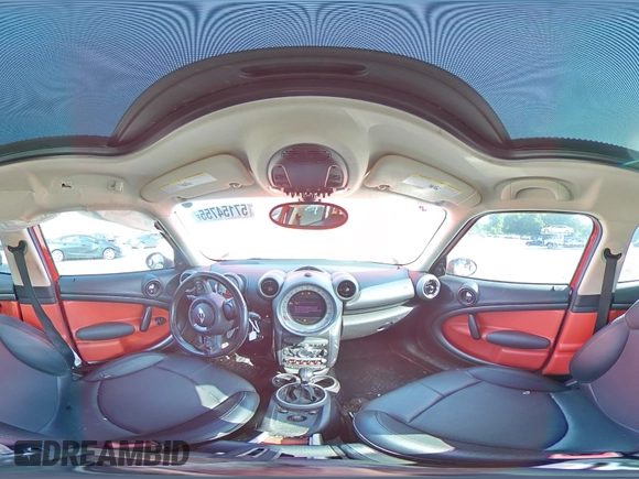 2012 MINI Countryman S with VIN WMWZC3C50CWL82827, listed as a Copart auction lot 57154755 with 149,751 mi miles and Salvage title. Bid and sale history available at DreamBid. Image 14.