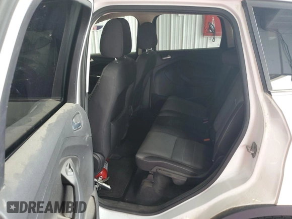 2013 Ford Escape SE with VIN 1FMCU9G92DUD72105, listed as a IAAI auction lot 42731657 with 213,477 mi miles and . Bid and sale history available at DreamBid. Image 23.